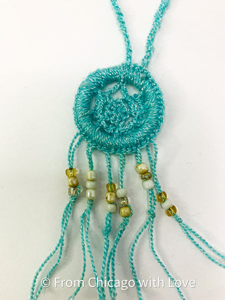 Crocheted dream catcher necklace - teal